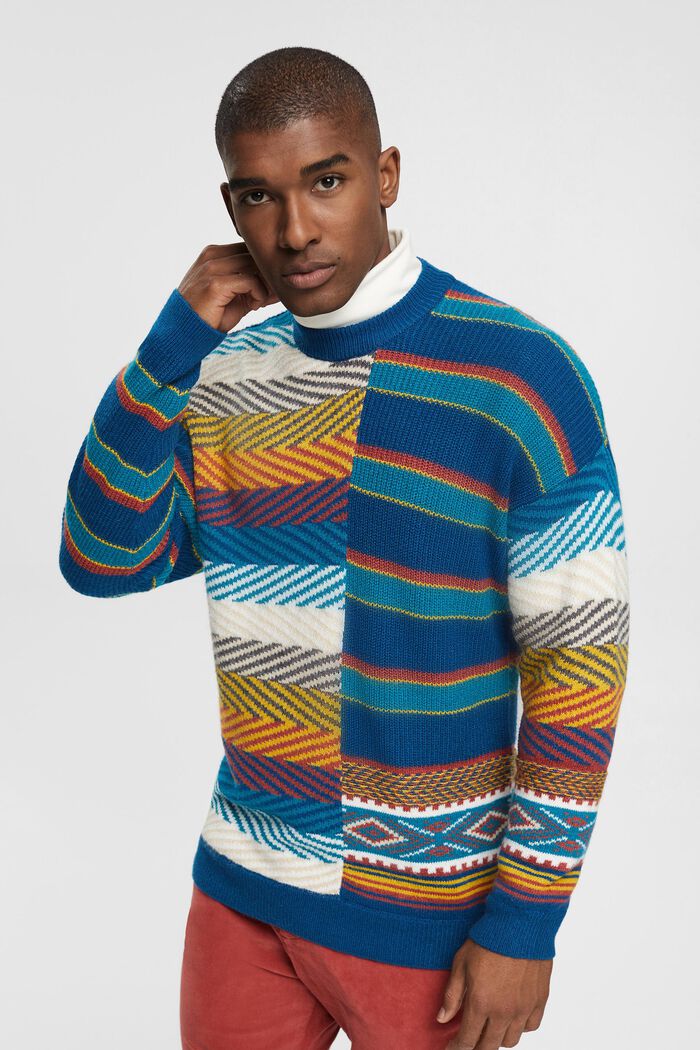 Dzianinowy sweter z miksem wzorów